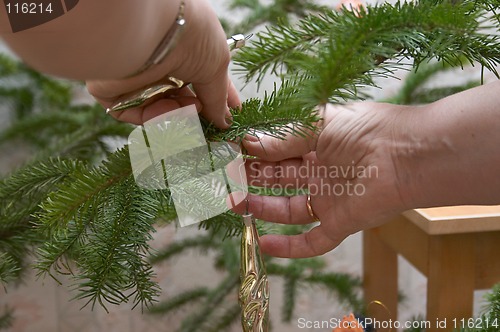 Image of Decorating of Christmas tree