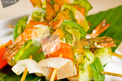 Image of shrimps and vegetables skewers