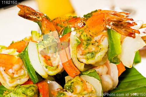 Image of shrimps and vegetables skewers