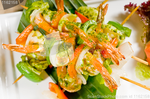 Image of shrimps and vegetables skewers