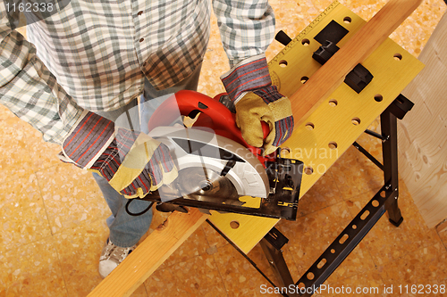 Image of carpenter at work detail