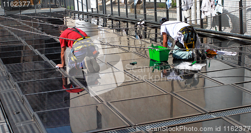 Image of glass cleaner manual worker