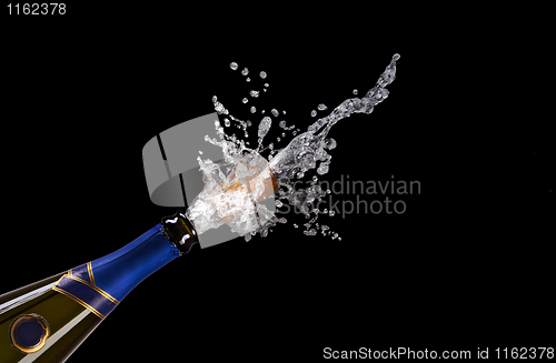 Image of explosion of champagne bottle cork
