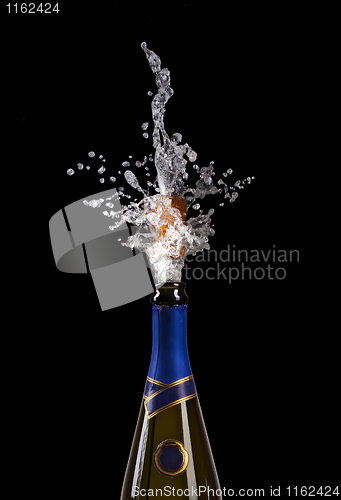 Image of explosion of champagne bottle cork