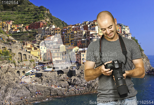 Image of smiling photographer in cinque terre italy