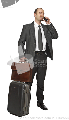 Image of business man travel and use mobile
