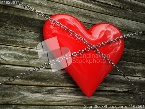 Image of red heart and metal chain