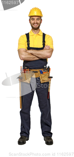Image of classic pose of young caucasian confident handyman