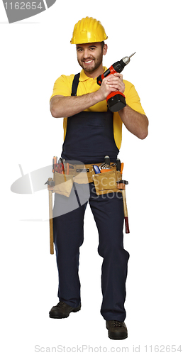 Image of caucasian handyman with red drill