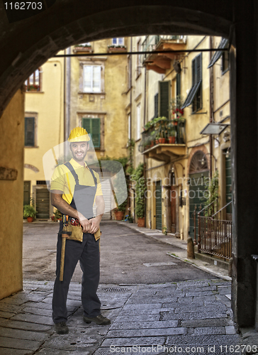 Image of Lucca town detail and yougn handyman