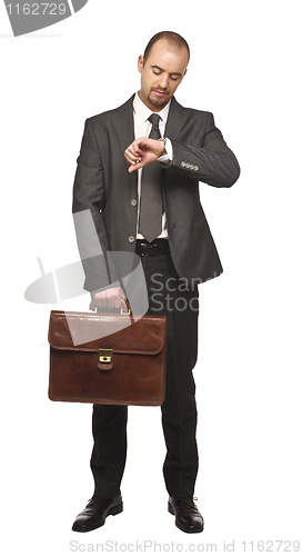 Image of businessman look his watch