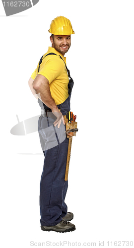 Image of positive standing manual worker isolated on white background