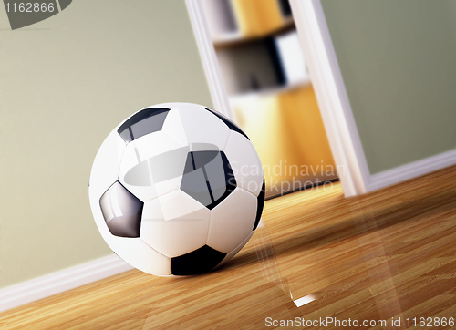 Image of soccer ball on wood floor