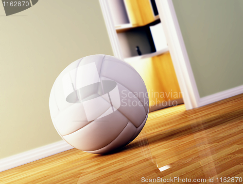 Image of volley ball on wood floor