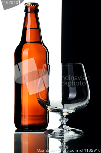 Image of Bottle of beer and glass, isolated