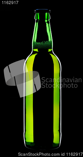 Image of Bottle of beer, isolated on a black background