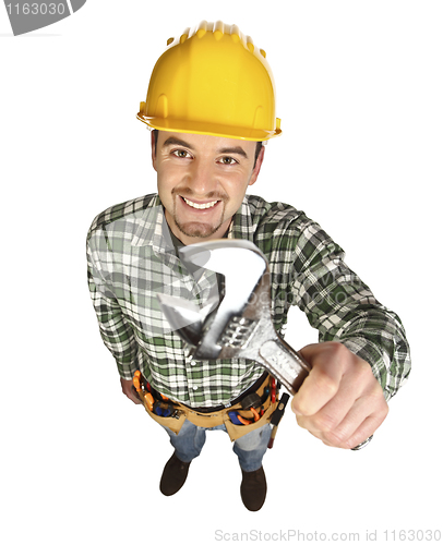 Image of handyman smile and hold wrench