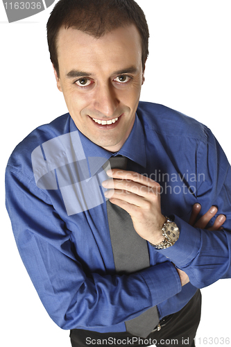 Image of businessman adjust tie