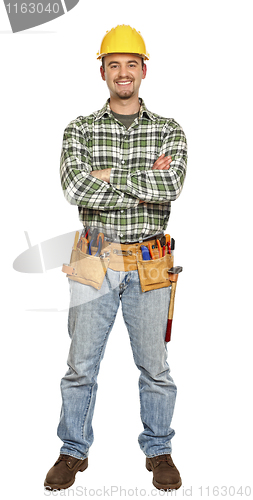 Image of standing young manual worker