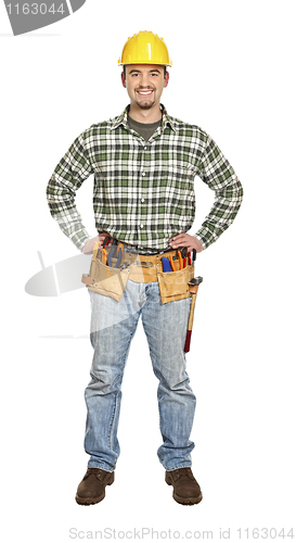 Image of standing young handyman