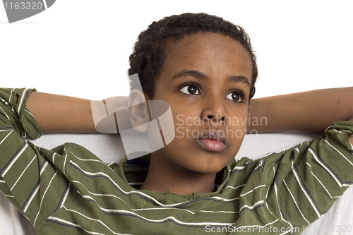 Image of Portrait of a young kid looking up