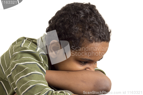 Image of Portrait of a young kid looking down