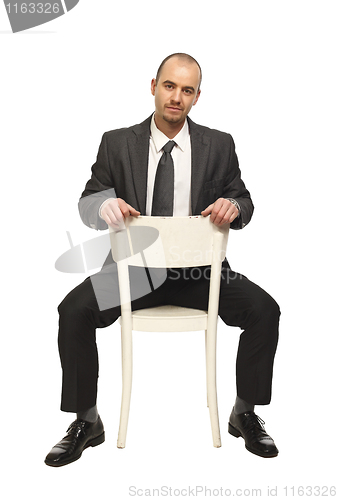 Image of man sit on chair