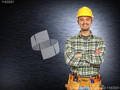 Image of positive handyman smiling