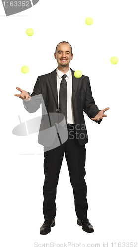 Image of business play with yellow balls