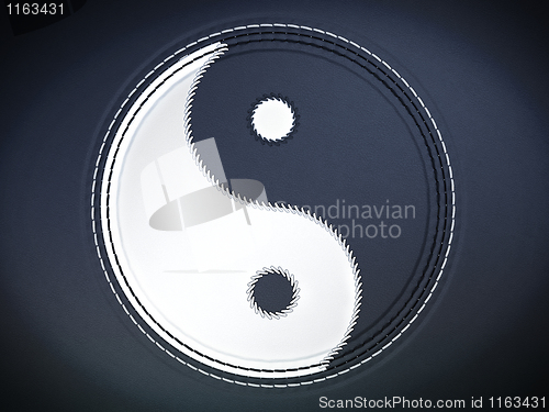 Image of Yin yan stitched symbol on leather