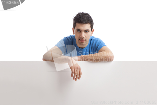 Image of Man holding a blank billboard