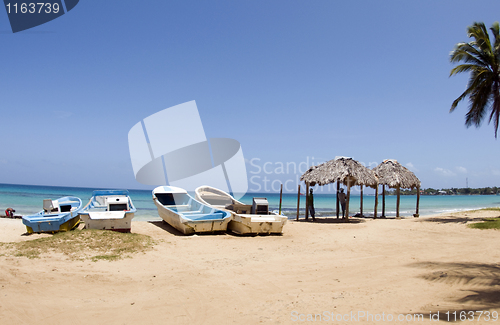 Image of fishing boats sandy beach view of brig bay Corn Island Nicaragua