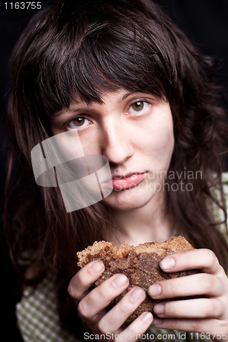 Image of beggar with a piece of bread