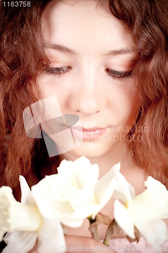 Image of beautiful woman with narcissus