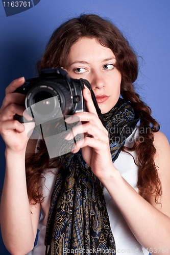 Image of beautiful woman-photographer