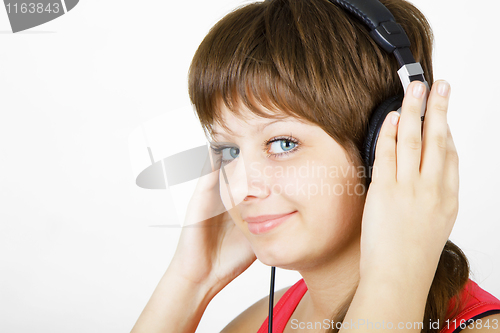 Image of girl teenager in the headphones