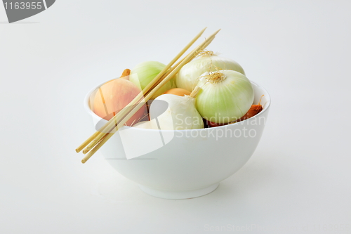 Image of Tasty kitchen. Fresh vegetables isolated on white