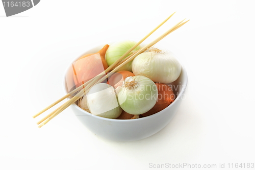 Image of Tasty kitchen. Fresh vegetables isolated on white