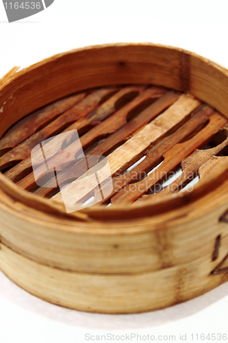 Image of Chinese steamed dimsum in bamboo containers traditional cuisine 