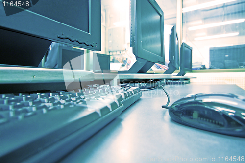 Image of workplace room with computers