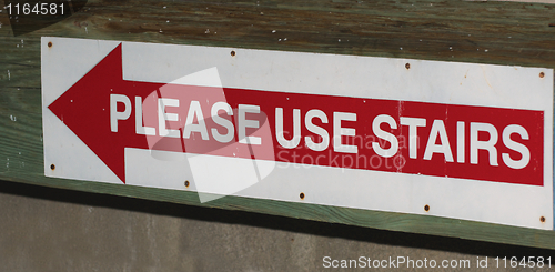 Image of Please use stairs sign