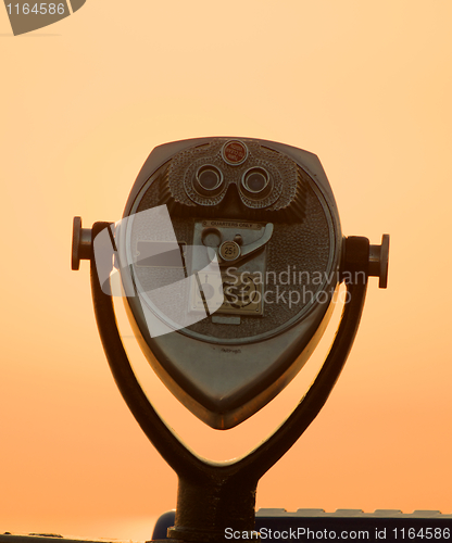 Image of Viewing binoculars shown at sunrise