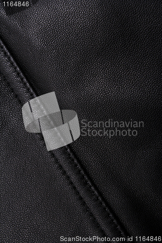 Image of Pocket on the black leather texture can use as background 