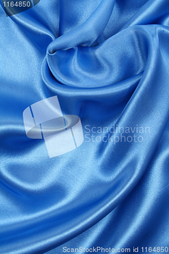 Image of Smooth elegant blue silk as background 