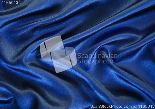 Image of Smooth elegant dark blue silk as background 