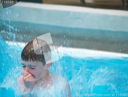 Image of boy jumping into pool