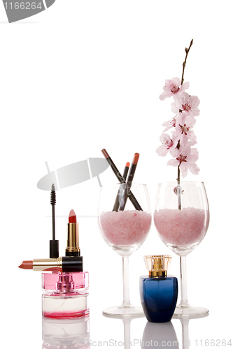 Image of cosmetics and cherry flower