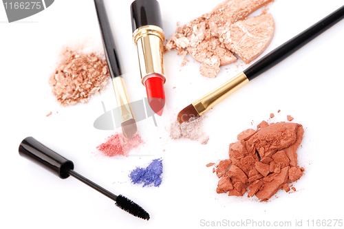 Image of Make-up brush, lipstick and different powder