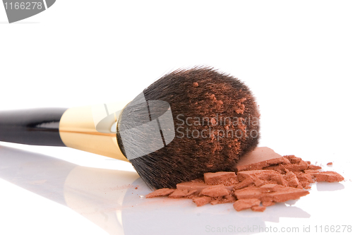 Image of Make-up brush and brown powder