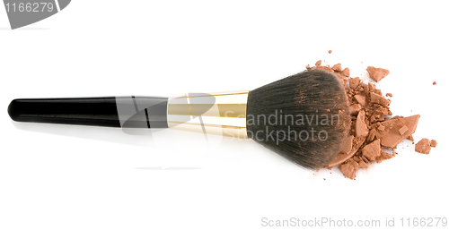 Image of Make-up brush and brown powder